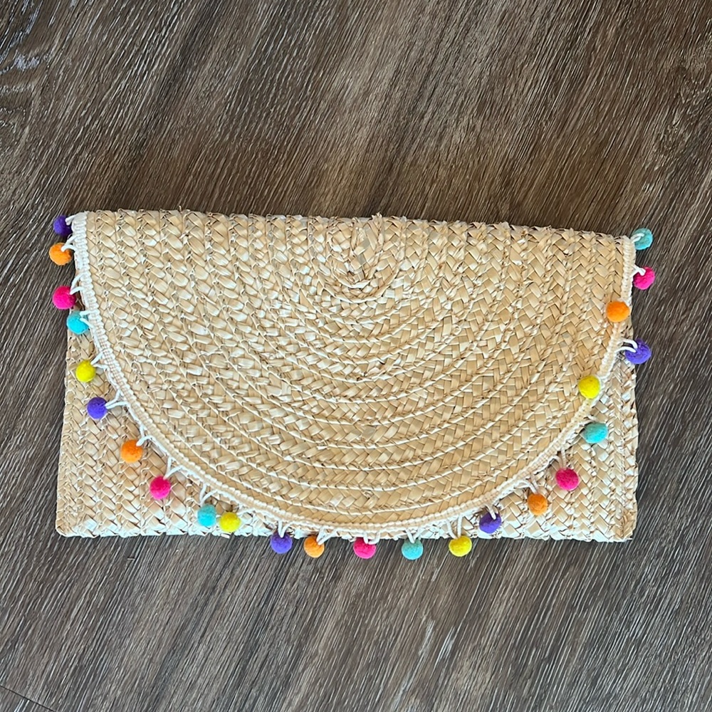 Stichfix Pom-Pom 14”x8” Straw Clutch. Excellent condition.